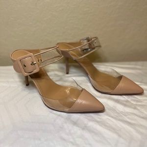 Aquazzura Peach and Clear strappy heels with pointed toes.